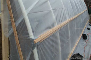 Figure 10. Poly attachment to hip board using one furring strip. This method is less secure than others since poly tends to tear at the screws.