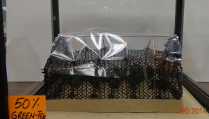 Figure 4. Row covers or fine insect screens installed over low-hoops can provide additional crop protection from small insect pests when installed early in the season.